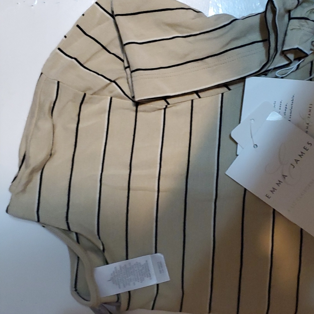 Large beige black and cream lycra. Emma James shirt.